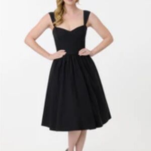 Unique Vintage black swing dress